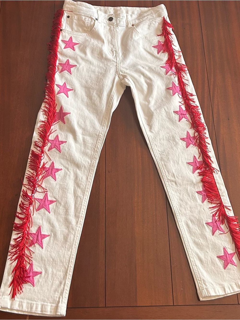 Stella McCartney Girls White Denims with Red Fringe, and Pink Appliqué stars.